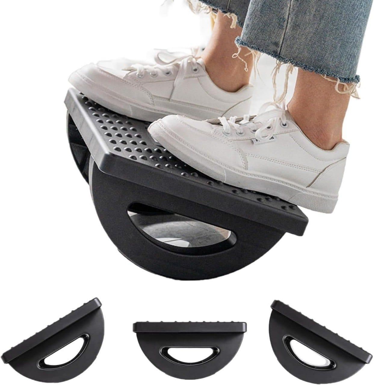 Person using a black step platform with white sneakers on a white background