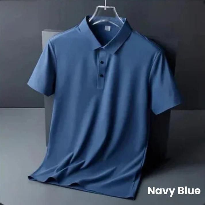 Navy blue polo shirt on a hanger against a dark background