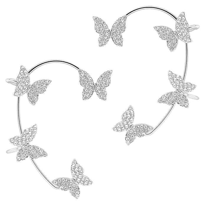 Silver butterfly earrings on a white background