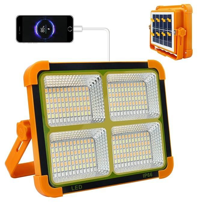 LED work light with solar panel and smartphone for charging on a white background