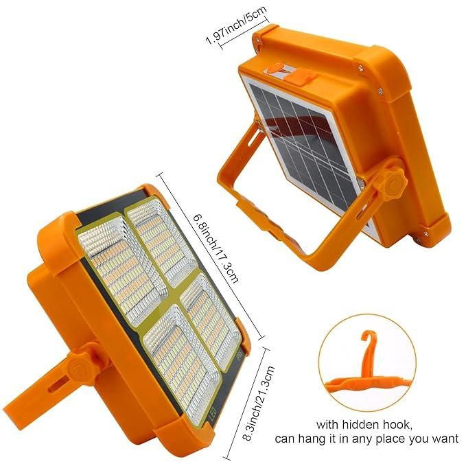 Orange solar flood light with dimensions and hook feature on a white background