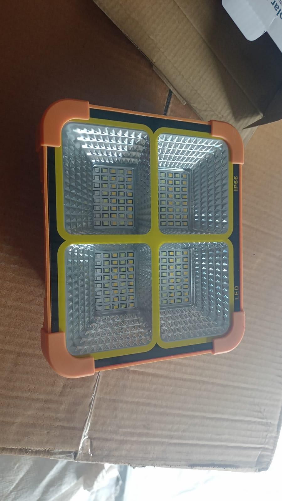 Solar panel light on a cardboard surface